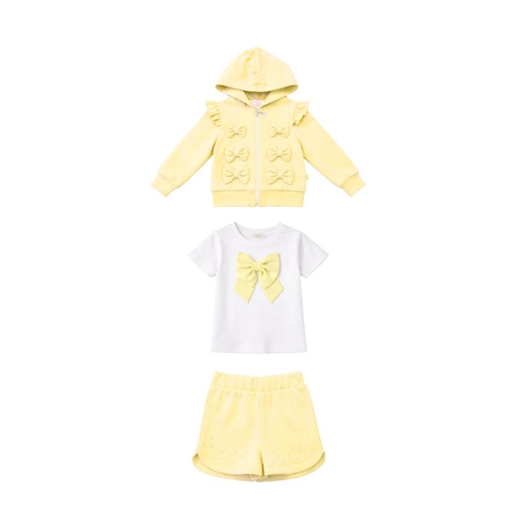 Caramelo yellow three‑piece short set for girls, featuring a bow T‑shirt, matching shorts and a ruffle‑trim jacket