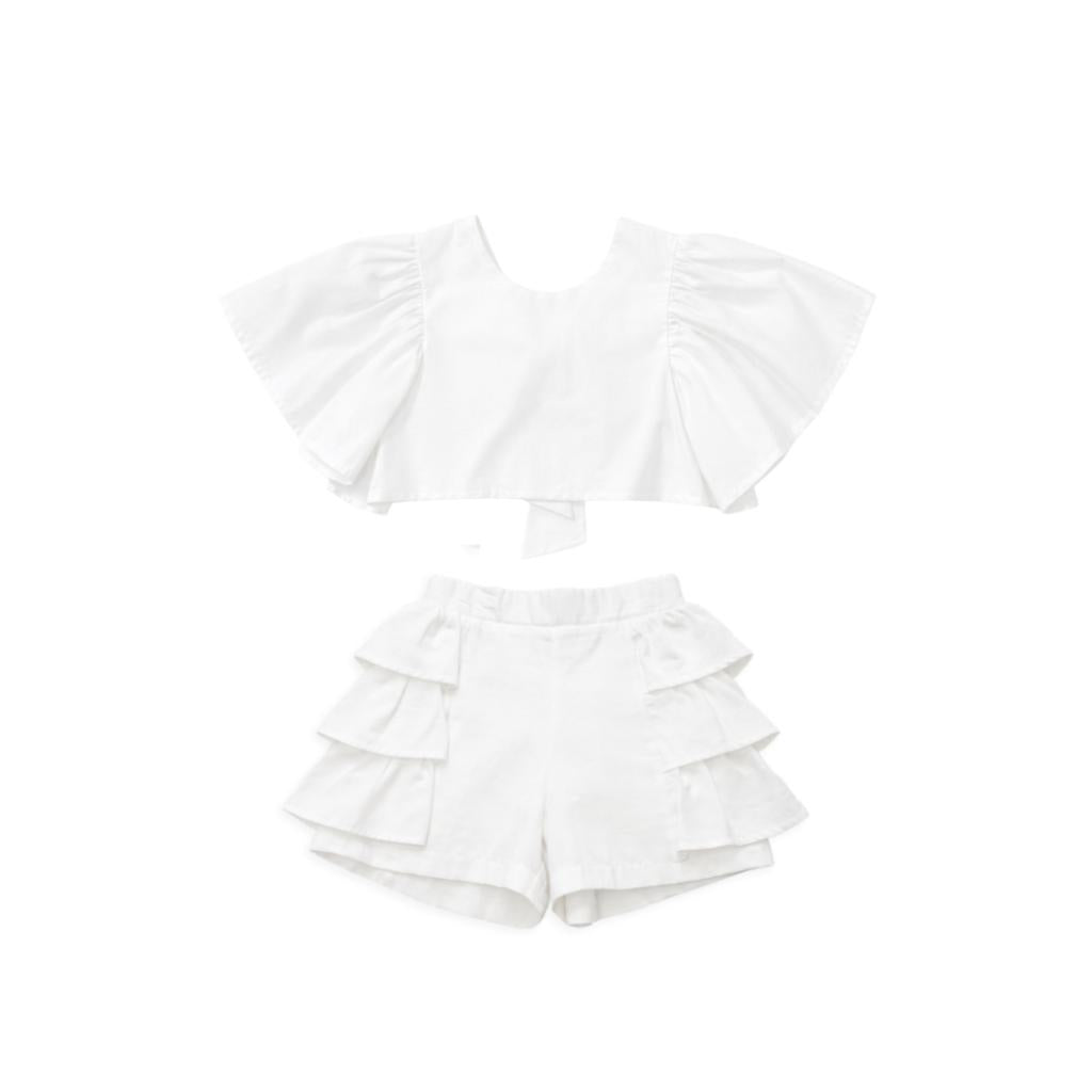 Caramelo white ruffle short set with statement back bow and matching layered‑ruffle shorts. A soft, elegant summer outfit for girls