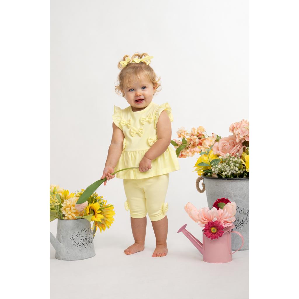 Caramelo yellow bow top and legging set for girls. 