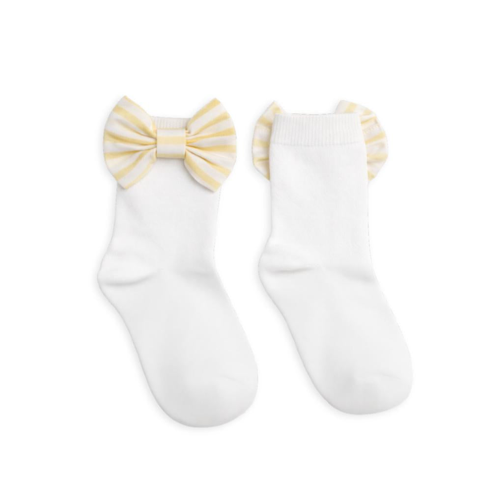 Caramelo white and yellow bow socks for babies and toddlers. Soft, cute and perfect for pairing with Caramelo outfits.