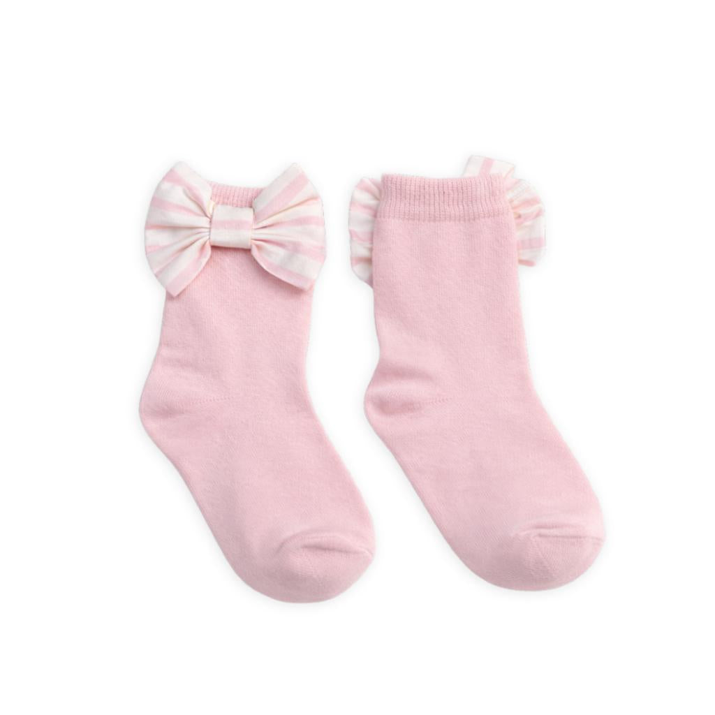 Caramelo pink baby socks with soft striped bows. A sweet, comfortable boutique accessory for little girls, perfect for pairing with Caramelo outfits