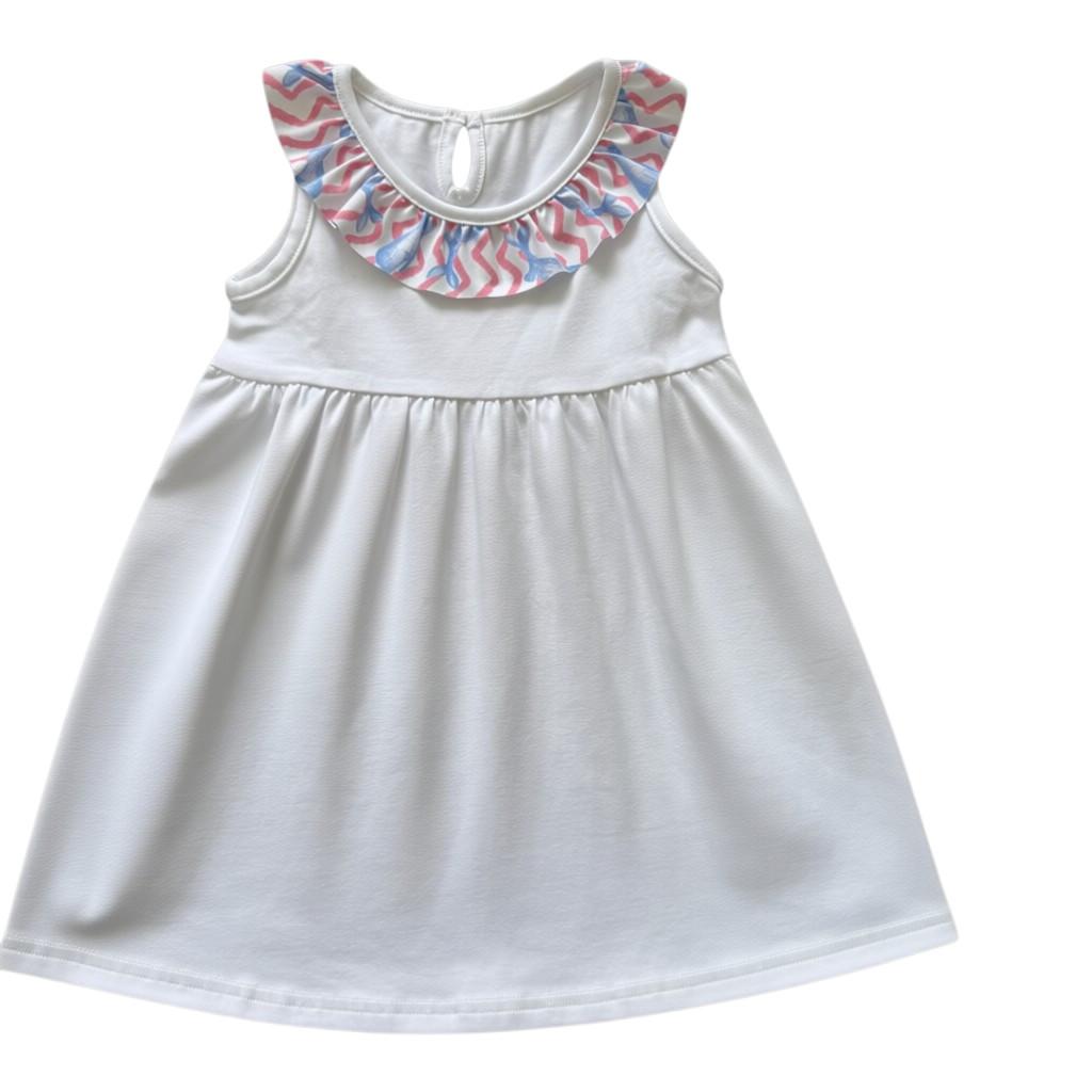 White baby dress with a colorful collar on a white background