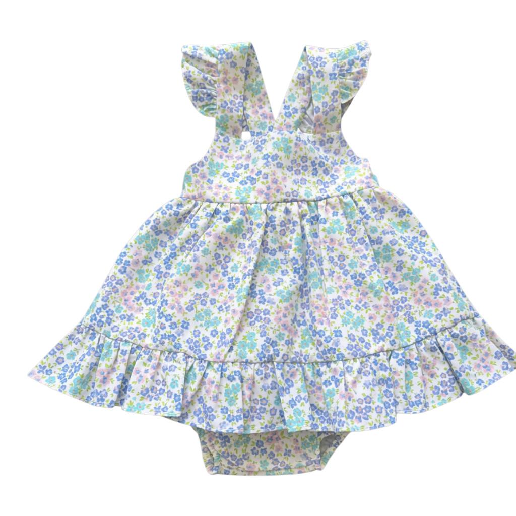 Floral baby dress with matching panties on a white background