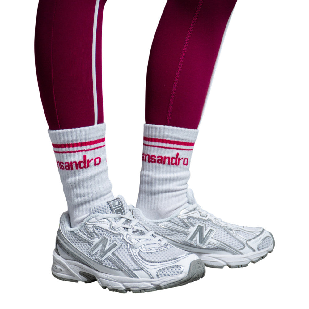 White socks with red accents and 'Ansandro' branding on a white background